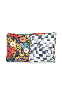 The Astrid Cotton Gauze Throw Blanket in Picnic Floral